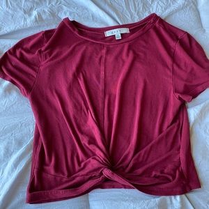 red knotted shirt, cropped